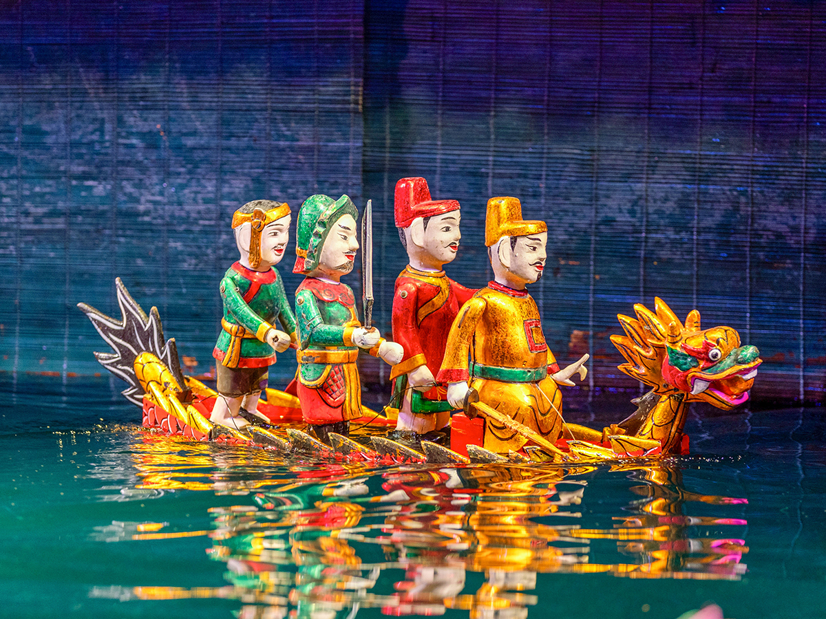 AP_0000_AdobeStock_1518876894 puppet dolls theatre show in Hanoi, Vietnam, Vietnamese water puppetry traditional puppet show on water in Vietnam