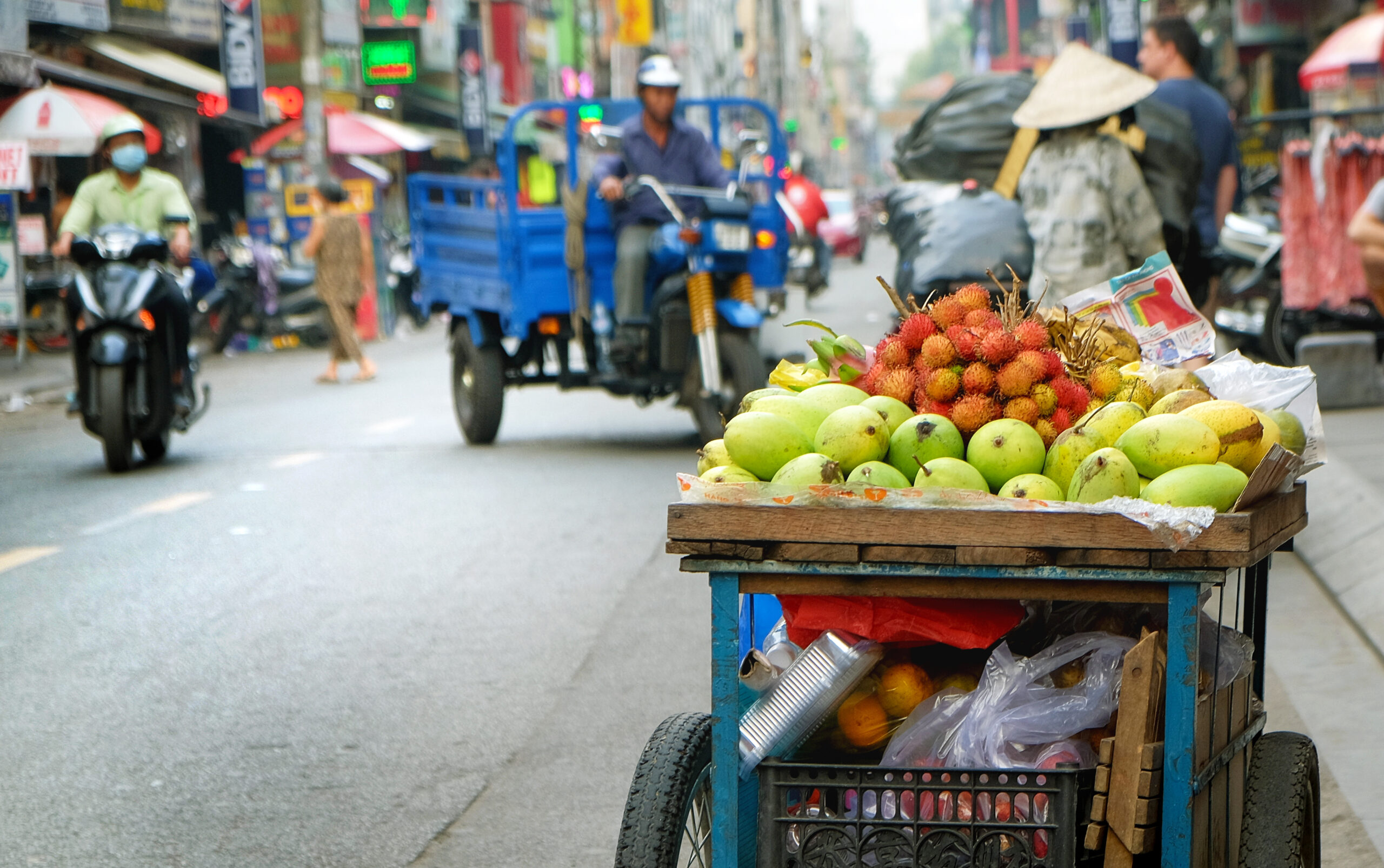 cart selling fruits on Vietnam streets