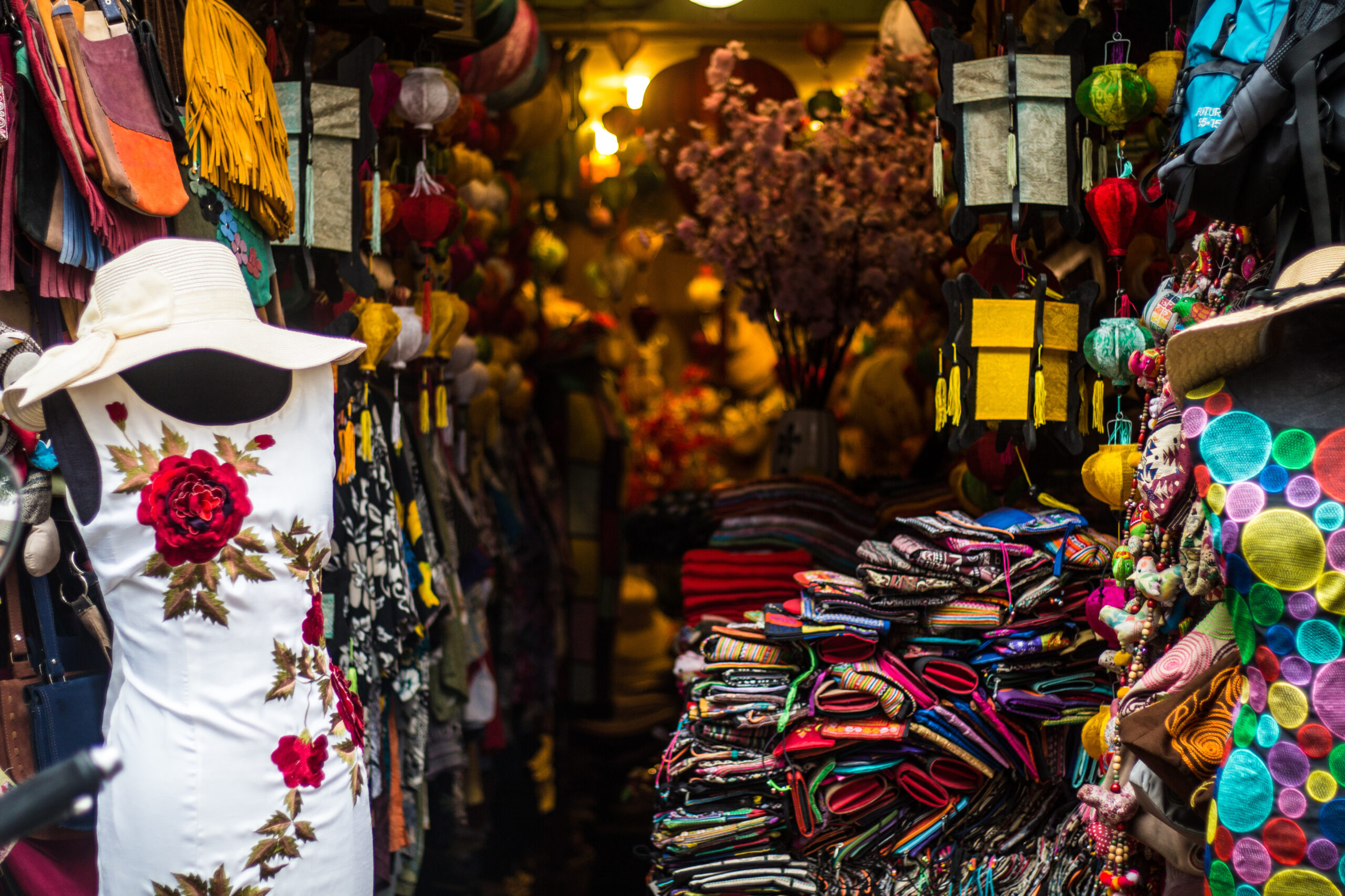 store front of a vendor selling clothes and various souvenirs