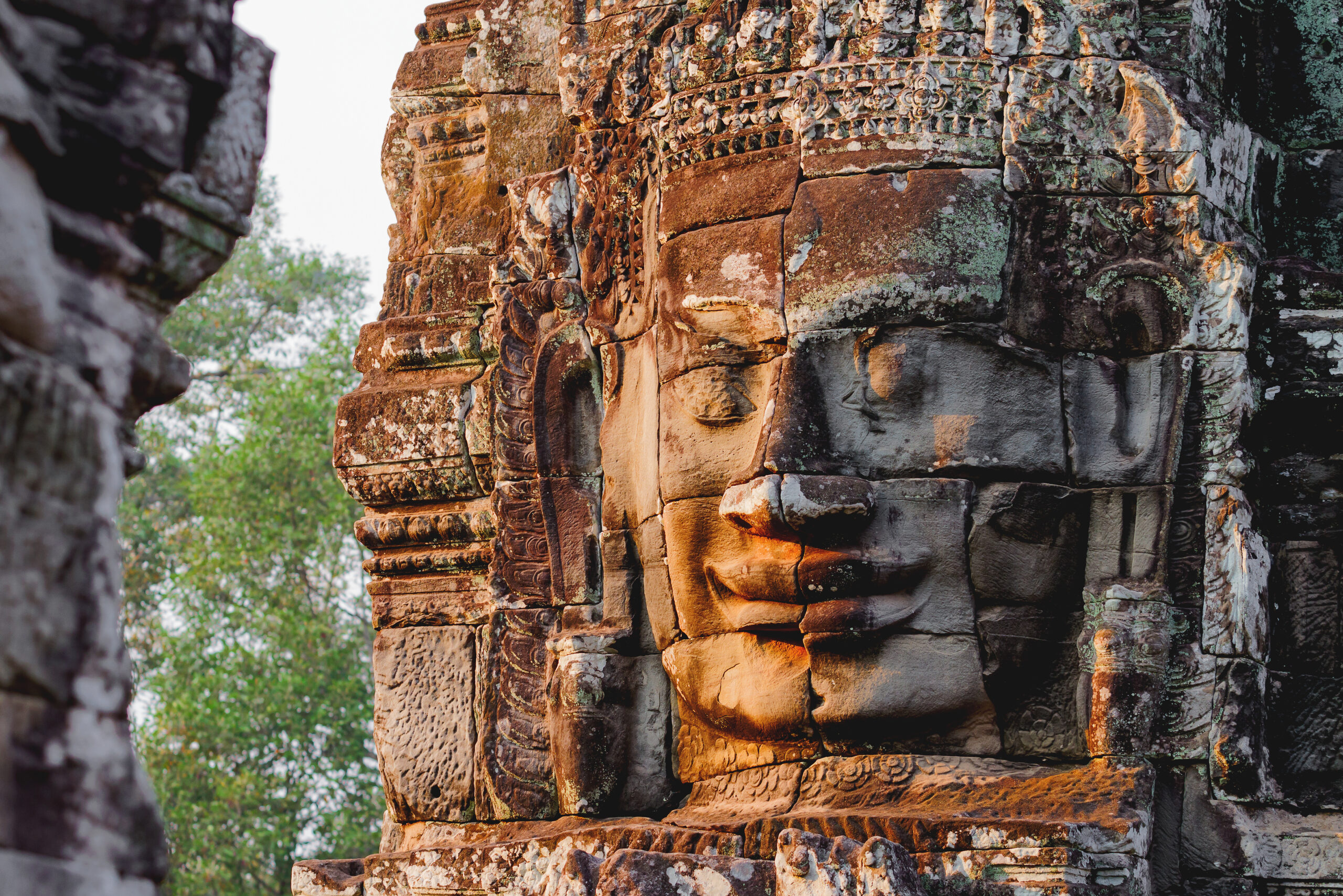 sculpted face on a tower at Angkor Wat