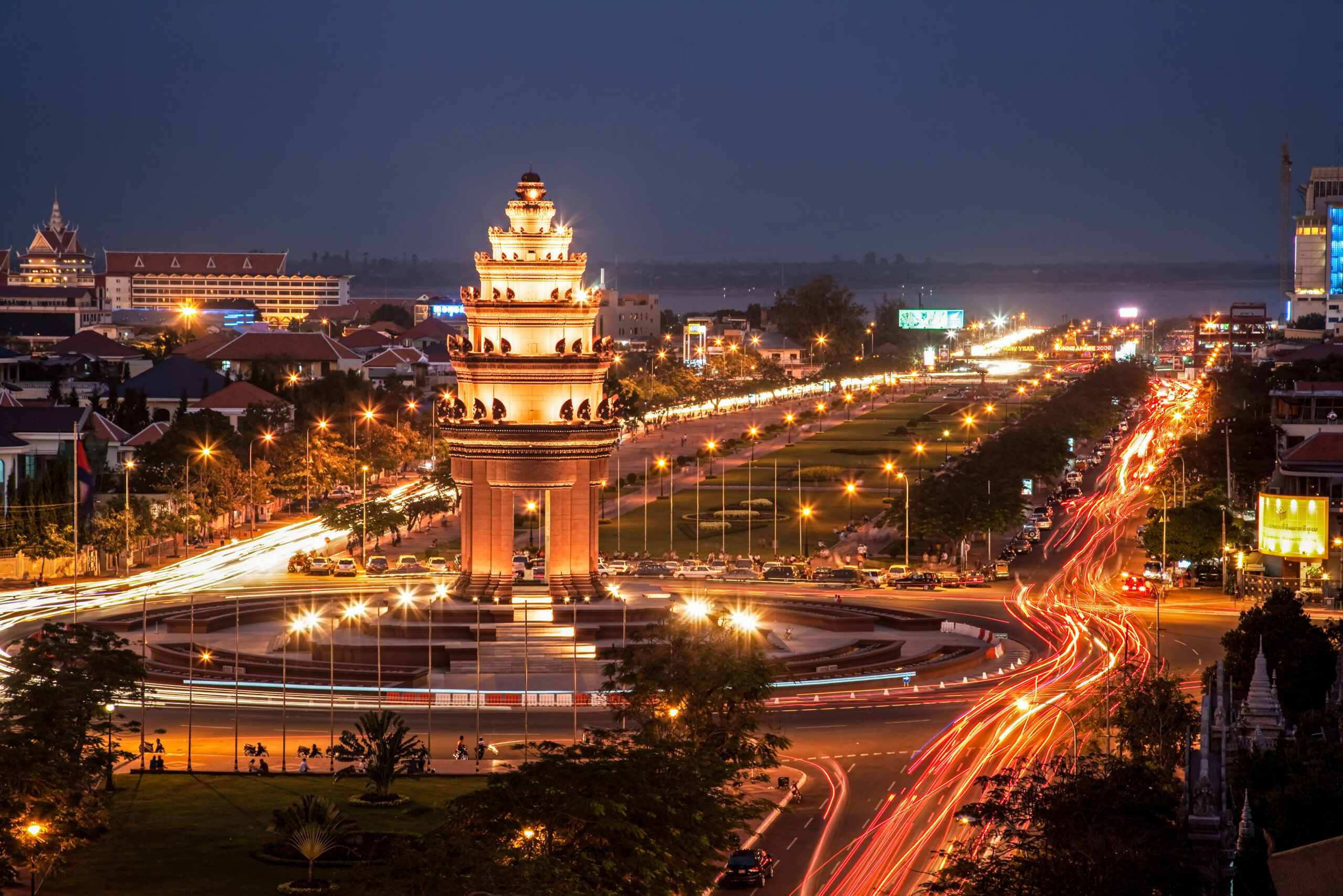 Independence Monument in Phnom Penh, Cambodia, Southeast Asia different types of skewered meat on a charcoal grill
