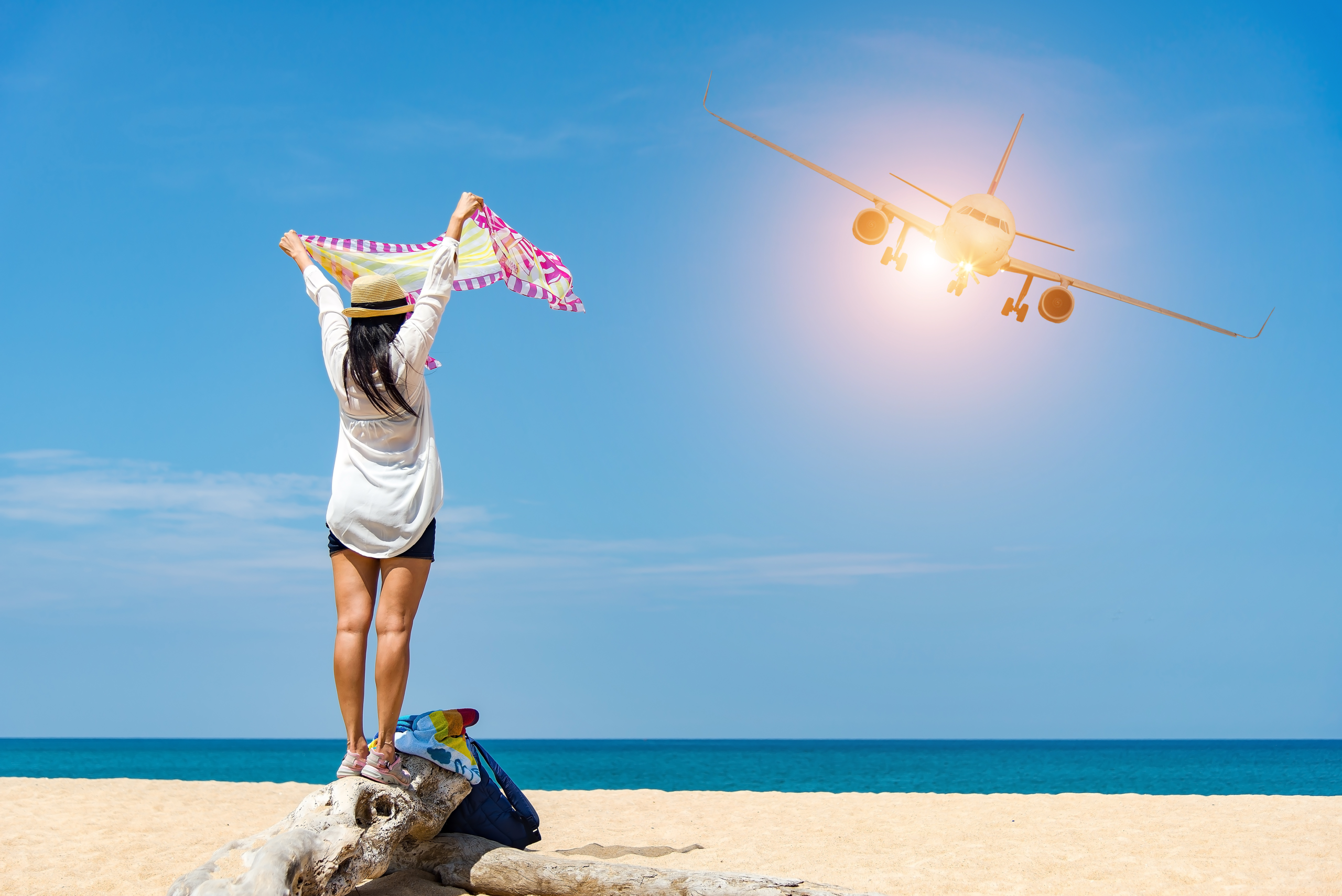 The plane is landing to phuket international airport at mai khao beach phuket thailand