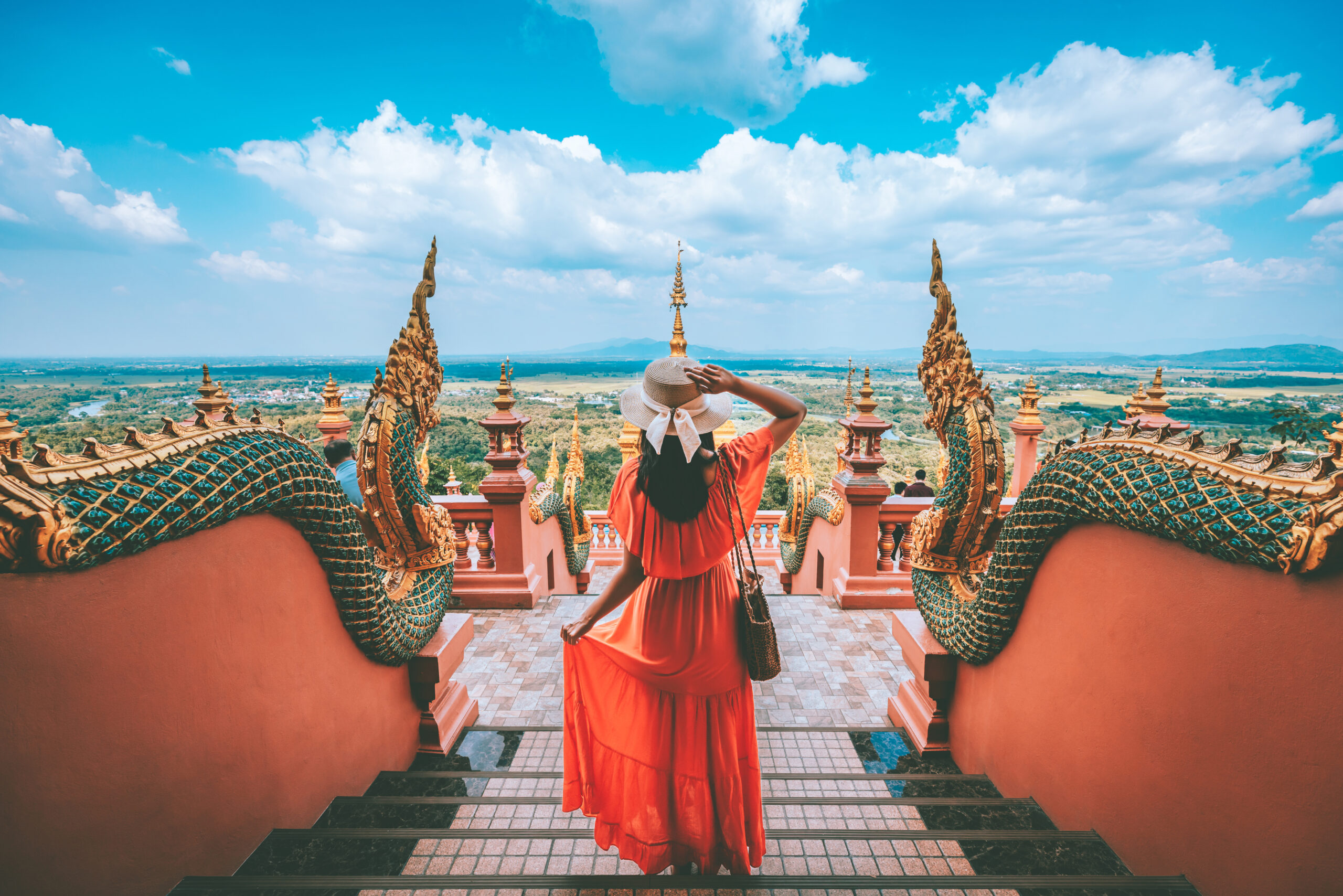 Traveler asian woman with dress travel in temple at Lampang Thailand